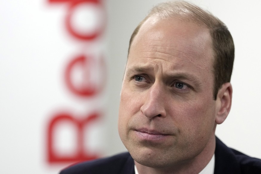 Britain&#039;s Prince William, The Prince of Wales, listens as he visits the British Red Cross at its headquarters in London, Tuesday, Feb. 20, 2024. The Prince of Wales undertakes engagements which r ...