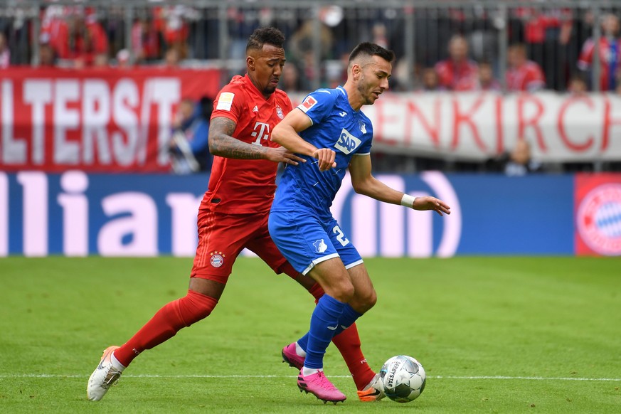 Jerome BOATENG Bayern Muenchen, Aktion,Zweikampf gegen Sargis ADAMYAN 1899 Hoffenheim. Fussball 1. Bundesliga,7.Spieltag,Spieltag07, FC Bayern Muenchen M - TSG 1899 Hoffenheim 1-2, am 05.10.2019 in Mu ...