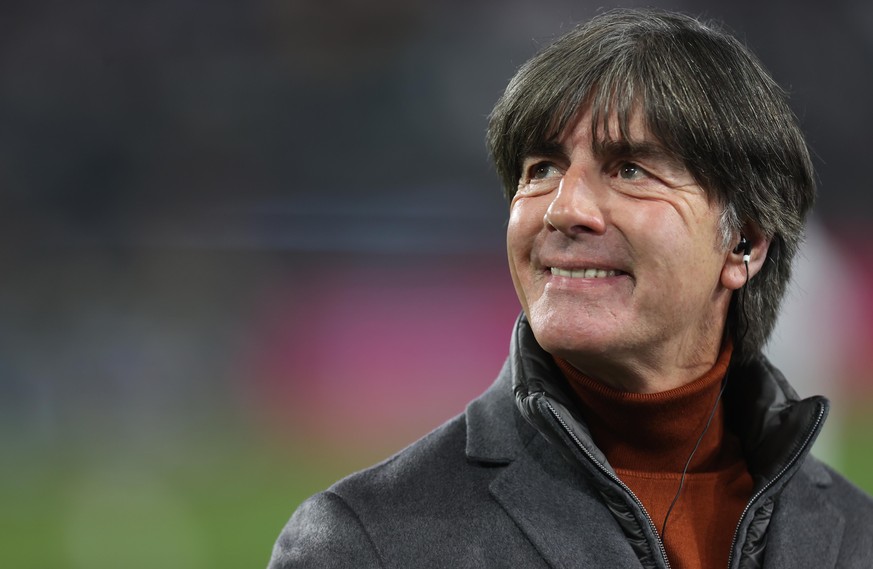 WOLFSBURG, GERMANY - NOVEMBER 11: Former Germany head coach Joachim Loew talks to TV prior to the 2022 FIFA World Cup Qualifier match between Germany and Liechtenstein at Volkswagen Arena on November  ...