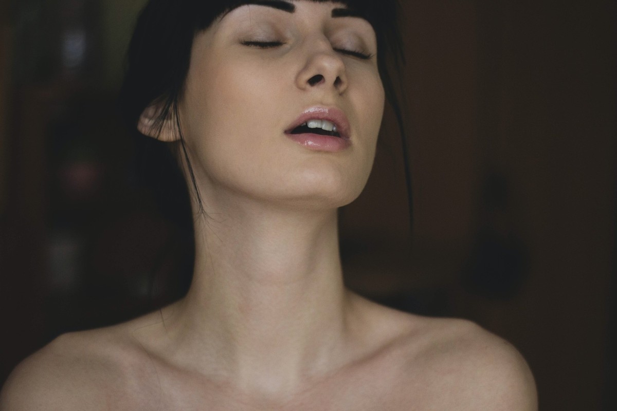 Orgasm Woman closed eyes naked