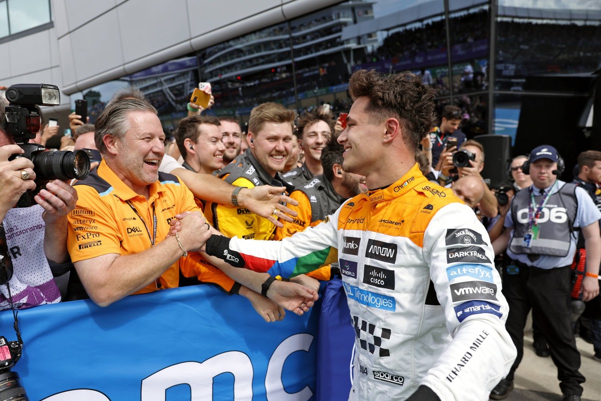 Formula 1 2023: British GP SILVERSTONE CIRCUIT, UNITED KINGDOM - JULY 09: Zak Brown, CEO, McLaren Racing, and Lando Norris, McLaren, 2nd position, celebrate in Parc Ferme during the British GP at Silv ...