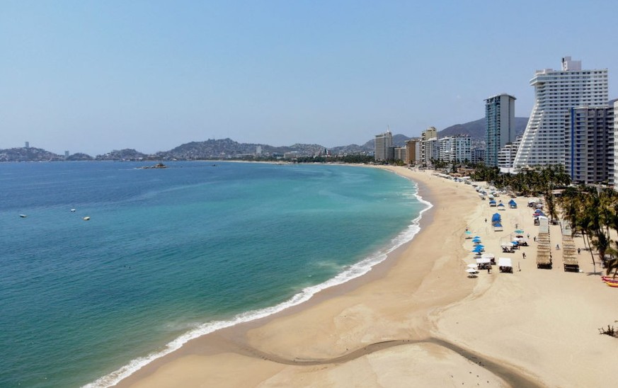 Aerial view of the empty beach in Acapulco, Guerrero state, Mexico on April 2, 2020. More than 20,000 cases of COVID-19 were registered in Latin America and the Caribbean by Wednesday -- doubling the  ...