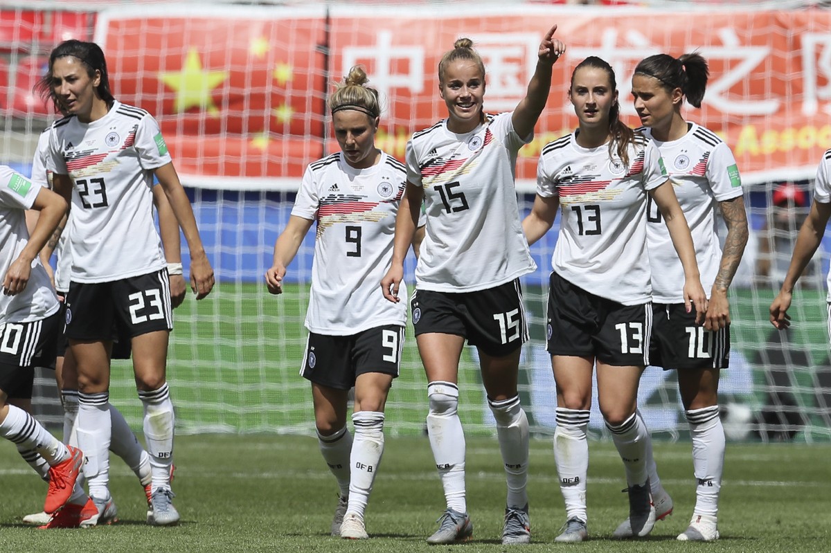 Germany&#039;s Giulia Gwinn, center, celebrates after scoring her side&#039;s first goal during the Women&#039;s World Cup Group B soccer match between Germany and China, at the Roazhon Park stadium,  ...