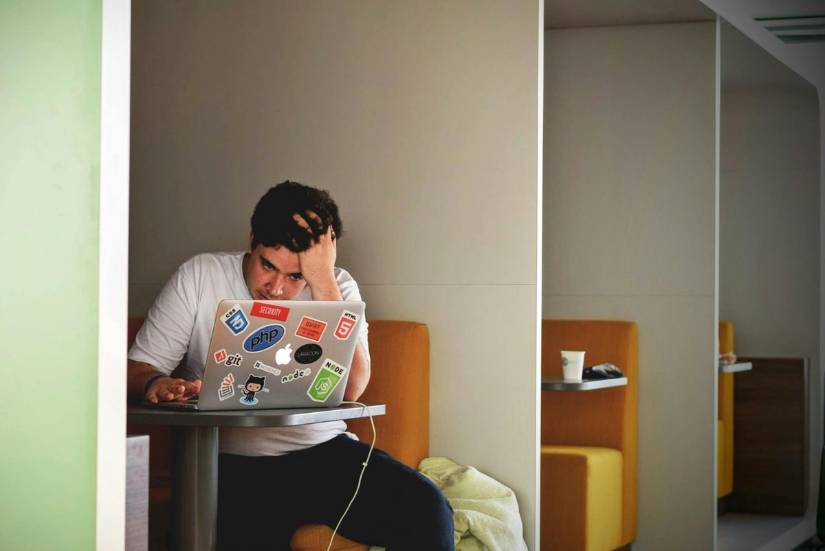 worried man student laptop
