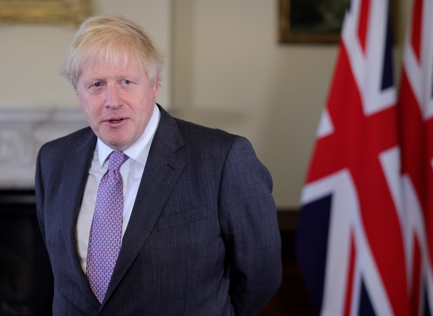 HANDOUT - 13.12.2020, England, London: Boris Johnson, Premierminister von Gro