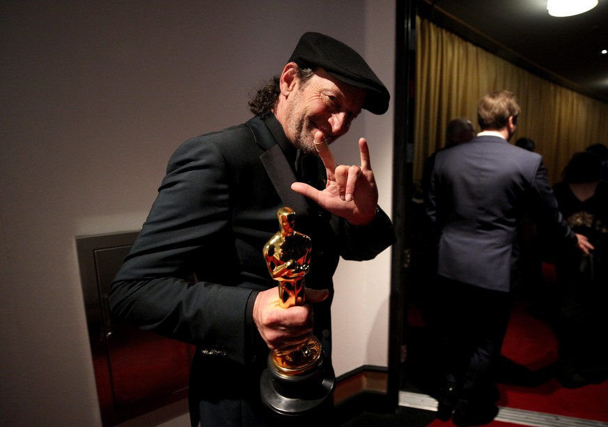 HOLLYWOOD, CALIFORNIA - MARCH 27: In this handout photo provided by A.M.P.A.S., Troy Kotsur, winner of the Actor in a Supporting Role award for ‘CODA’, is seen backstage during the 94th Annual Academy ...