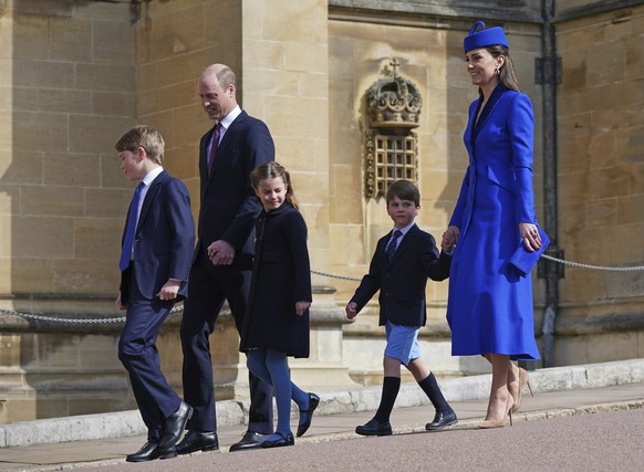 Britain&#039;s Prince William and Kate, Princess of Wales with their children Prince George, left, Princess Charlotte and Prince Louis attend the Easter Mattins Service at St George&#039;s Chapel at W ...