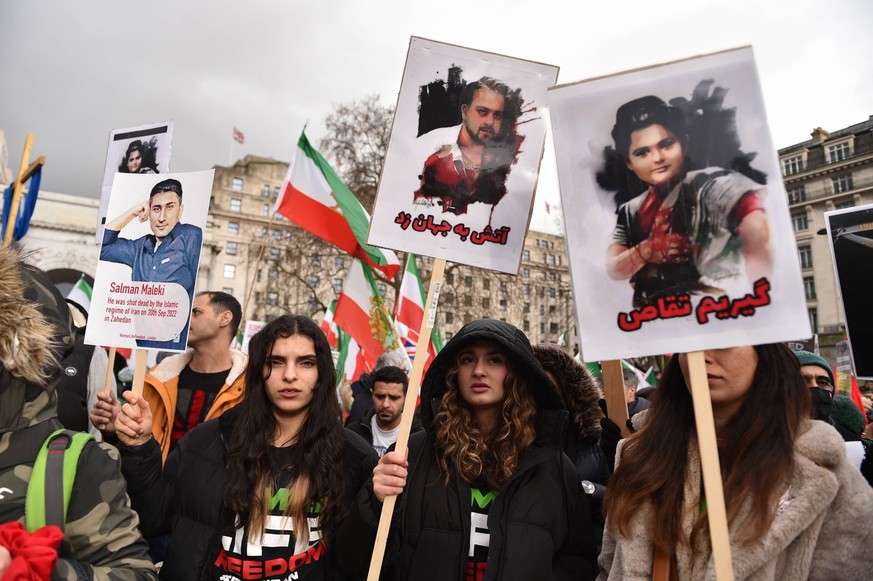 January 8, 2023, London, England, United Kingdom: Protesters take part in a demonstration in central London, calling to stop executions of protesters in Iran, and in solidarity with the freedom uprisi ...