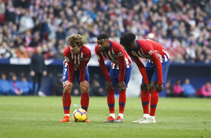 Antoine Griezmann of Atletico de Madrid, Thomas Lemar of Atletico de Madrid and Thomas Partey of Atletico de Madrid during the LaLiga 2018/19 match between Atletico de Madrid and Getafe, at Wanda Metr ...