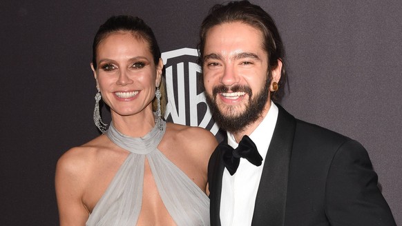 BEVERLY HILLS, CA - JANUARY 06: Heidi Klum (L) and Tom Kaulitz attend the 2019 InStyle and Warner Bros. 76th Annual Golden Globe Awards Post-Party at The Beverly Hilton Hotel on January 6, 2019 in Bev ...