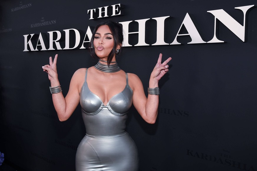 Los Angeles Premiere Of Hulu s The Kardashians FOR EDITORIAL USE ONLY In this handout photo provided by Hulu/The Walt Disney Company, Kim Kardashian wearing a custom Thierry Mugler latex dress that wa ...