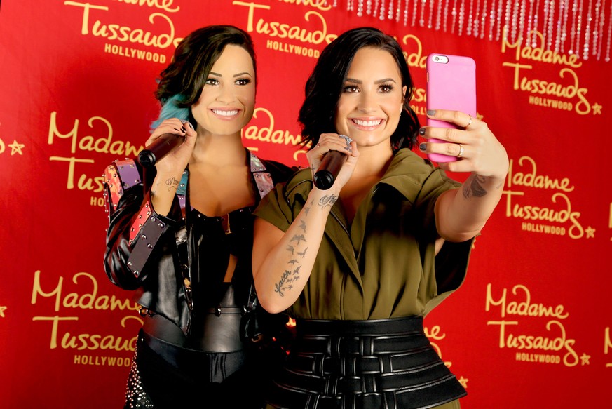 HOLLYWOOD, CA - AUGUST 17: Demi Lovato receives the ultimate 23rd birthday gift from Madame Tussauds Hollywood: her own wax figure on August 17, 2015 in Hollywood, California. (Photo by Rachel Murray/ ...