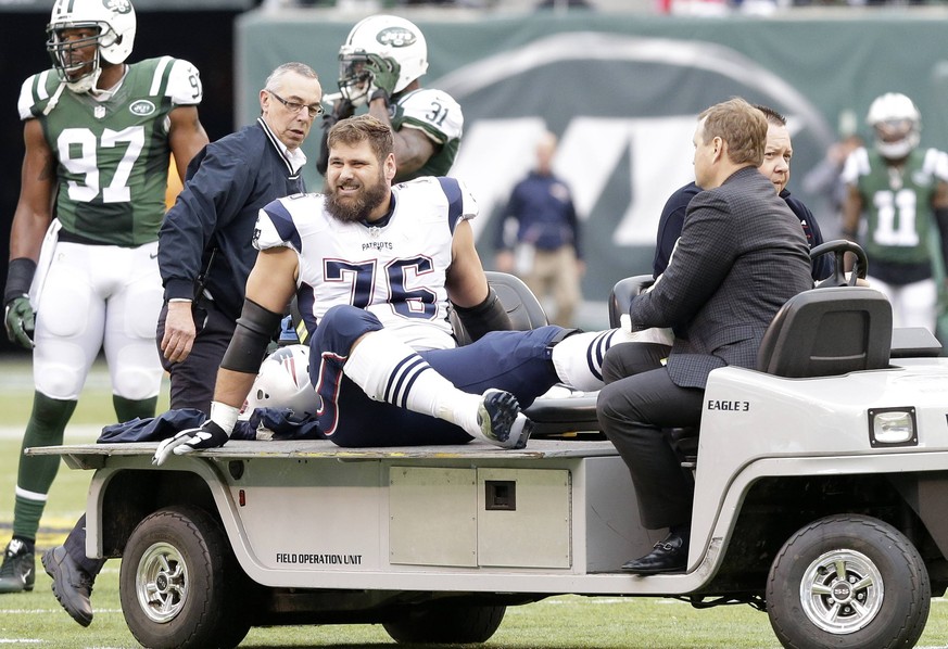 Themen der Woche - SPORT New England Patriots Sebastian Vollmer is carted off of the field with an injury against the New York Jets at MetLife Stadium in East Rutherford, New Jersey on December 27, 20 ...