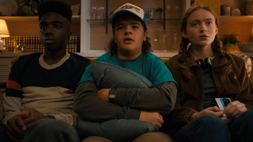 Stranger Things Season 4 2022 L to R Caleb McLaughlin as Lucas Sinclair, Gaten Matarazzo as Dustin Henderson and Sadie Sink as Max Mayfield in Stranger Things Season 4 2022 Photo credit: Netflix PUBLI ...