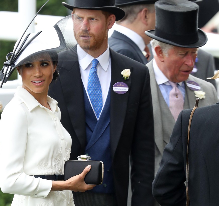 ASCOT, ENGLAND - JUNE 19: Meghan, Duchess of Sussex, Prince Harry, Duke of Sussex and Prince Charles, Prince of Wales attend Royal Ascot Day 1 at Ascot Racecourse on June 19, 2018 in Ascot, United Kin ...