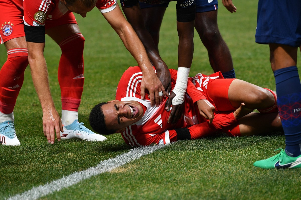 ATLANTA, USA - JULY 5: Jamal Musiala of Bayern Munich gets injured during 2025 FIFA Club World Cup quarter-final football match between Paris Saint-Germain and Bayern Munich at Mercedes Benz Stadium i ...