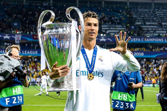 Mandatory Credit: Photo by Robbie Stephenson/Jmp/Shutterstock 9694113do Cristiano Ronaldo of Real Madrid celebrates winning The Champions League with the trophy- Mandatory by-line: Robbie Stephenson/J ...