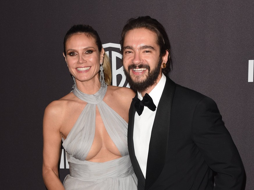 BEVERLY HILLS, CA - JANUARY 06: Heidi Klum (L) and Tom Kaulitz attend the 2019 InStyle and Warner Bros. 76th Annual Golden Globe Awards Post-Party at The Beverly Hilton Hotel on January 6, 2019 in Bev ...