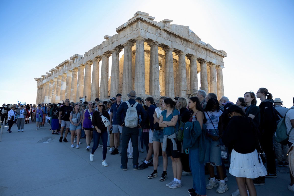 The 5th century B.C. Parthenon temple stands free of scaffolding on the Acropolis hill in Athens, Sunday, Oct. 12, 2025, after the removal of restoration structures that had covered parts of the ancie ...