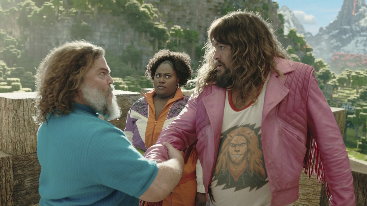 This image released by Warner Bros. Pictures shows, from left, Jack Black, Danielle Brooks and Jason Momoa in a scene from &quot;A Minecraft Movie.&quot; (Warner Bros. Pictures via AP)