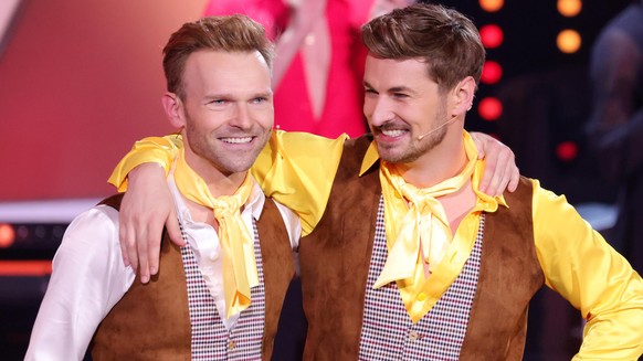 COLOGNE, GERMANY - FEBRUARY 26: Nicolas Puschmann (R) and Vadim Garbuzov pose on stage during the pre-show &quot;Wer tanzt mit wem? Die grosse Kennenlernshow&quot; of the television competition &quot; ...