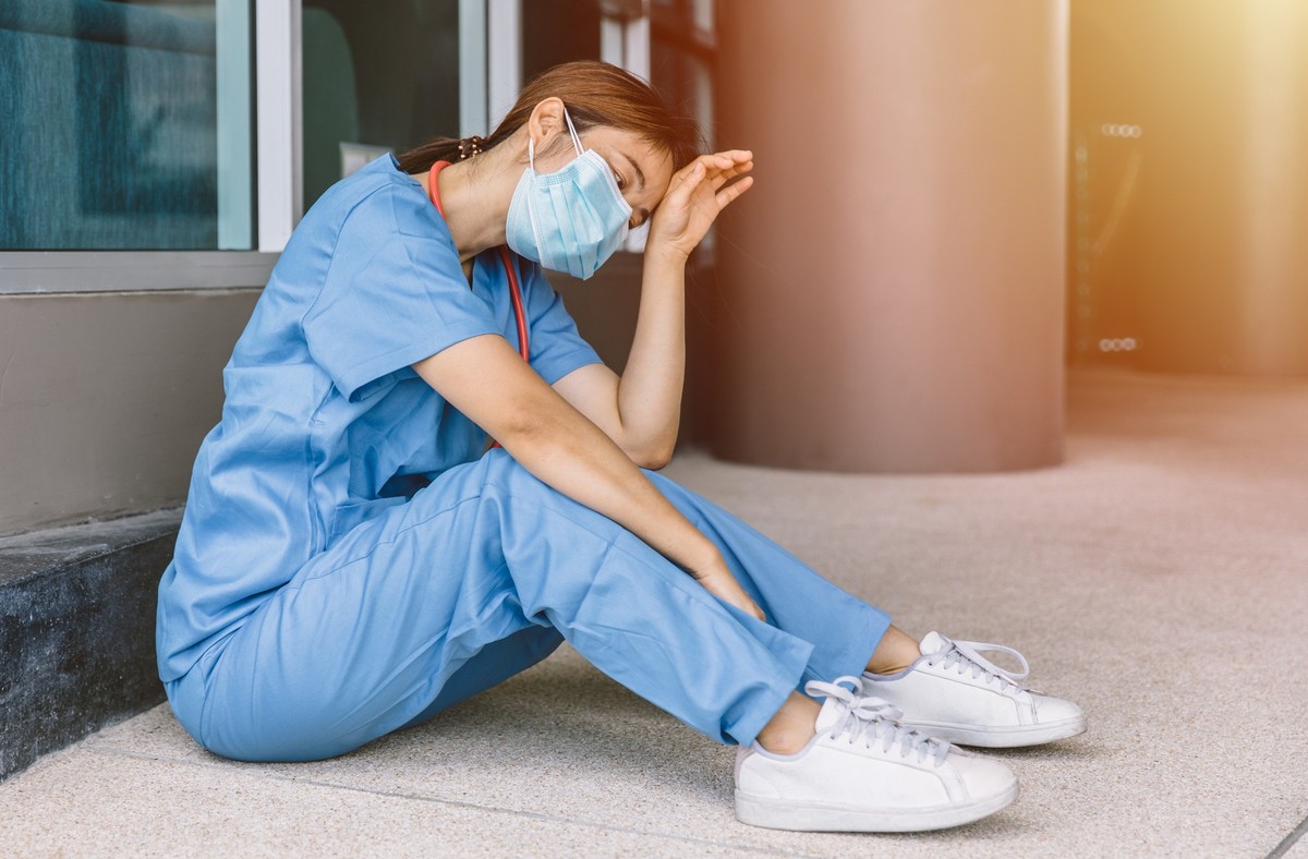 Nurse hardwork tired and fatigue. Doctor and Medical staff worker exhausted from Coronavirus(COVID-19) pandemic in hospital.