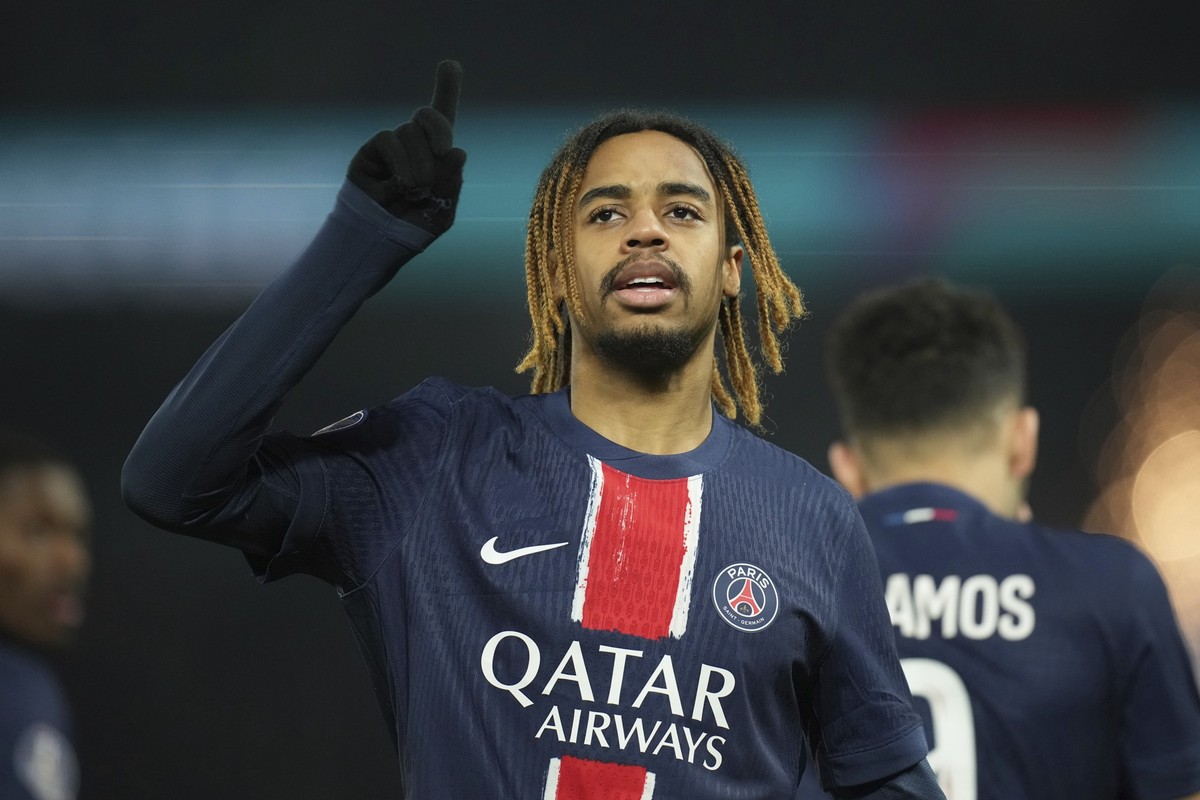 PSG's Bradley Barcola celebrates scoring his side first goal during the French League One soccer match between Paris Saint-Germain and Lille, Saturday, March 1, 2025 at the Parc des Princes stadi ...