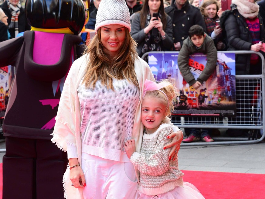 Katie Price (L) and daughter Princess Andre attends The Lego Movie VIP film screening of CGI adventure, starring some of Lego s most popular figures, which features the voices of Elizabeth Banks, Chri ...
