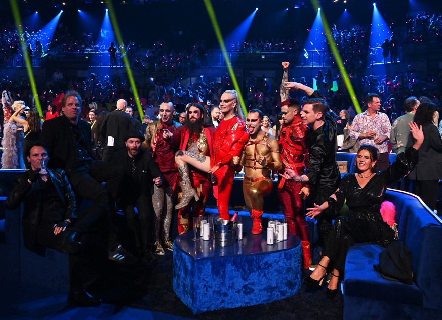 13.05.2023, Großbritannien, Liverpool: Lord Of The Lost aus Deutschland reagieren nach ihrem Auftritt mit «Blood &amp; Glitter» beim Finale des 67. Eurovision Song Contest (ESC) in der M&amp;S Bank Ar ...