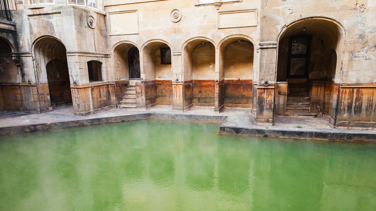 Bath, United Kingdom - November 2, 2017: Roman baths of Bath, Somerset. Inner pool view on a sunny day Model Released Property Released xkwx roman baths bath roman somerset uk england baths travel arc ...