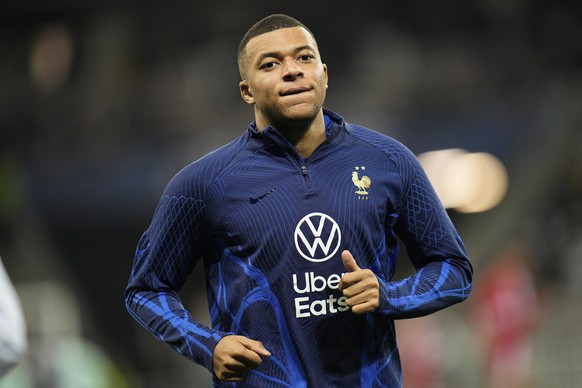 France&#039;s Kylian Mbappe warms up before the Euro 2024 group B qualifying soccer match between, France and Gibraltar in Nice, France, Saturday, Nov. 18, 2023. (AP Photo/Daniel Cole)