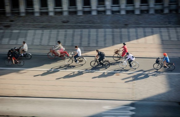 COPENHAGEN, DENMARK - AUGUST 26: Bicycles ride on a bicycle lane in downtown Copenhagen early in the morning on August 26, 2022 in Copenhagen, Denmark. (Photo by Thomas Trutschel/Photothek via Getty I ...