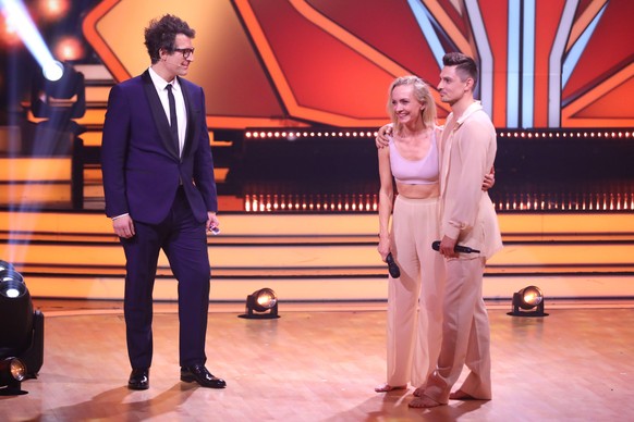 COLOGNE, GERMANY - MARCH 11: Daniel Hartwich, Janin Ullmann and Zsolt Sandor Cseke are seen on stage during the 3rd show of the 15th season of the television competition show &quot;Let&#039;s Dance&qu ...