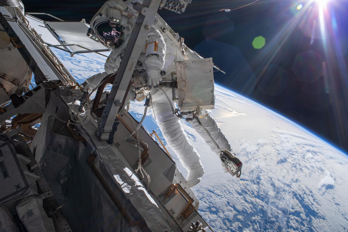 March 23, 2022, Earth Atmosphere: Astronaut Matthias Maurer of ESA (European Space Agency) is pictured on the International Space Station's truss structure during a spacewalk to install thermal g ...