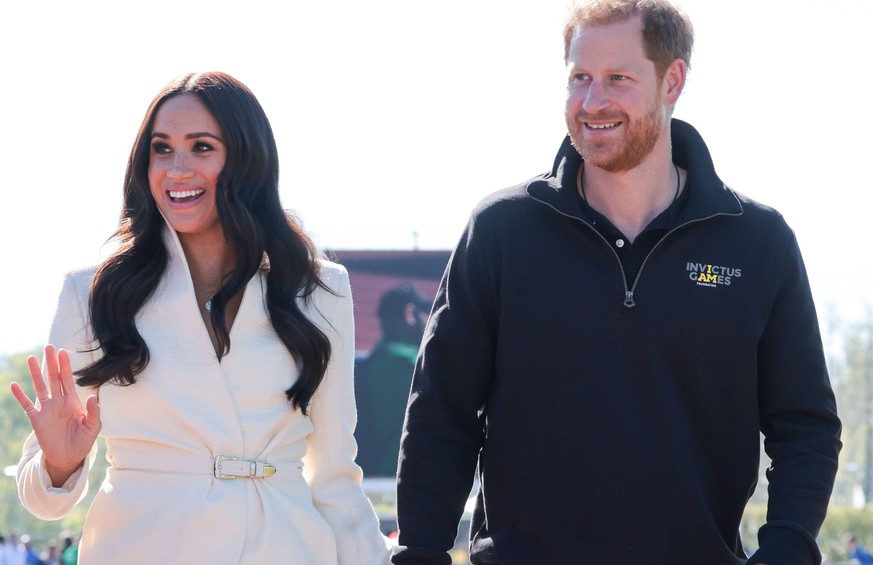 THE HAGUE, NETHERLANDS - APRIL 17: Prince Harry, Duke of Sussex and Meghan, Duchess of Sussex attend the Athletics Competition during day two of the Invictus Games The Hague 2020 at Zuiderpark on Apri ...