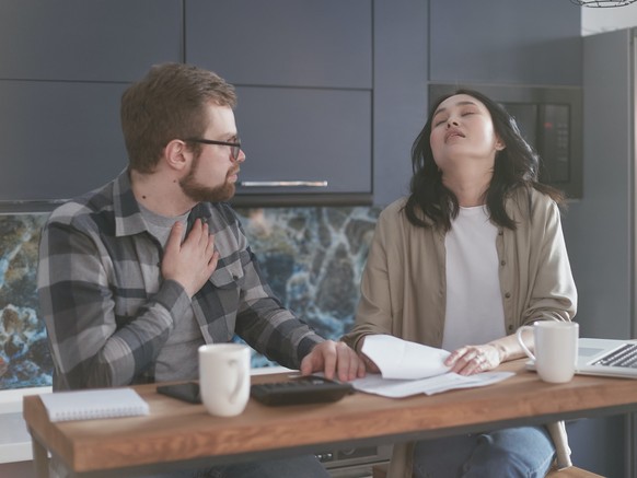 unhappy couple fighting finance