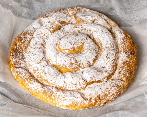 Typical dessert from Mallorca, Spain, called ensaimada based on flour, eggs, butter, sugar and some variety with angel hair