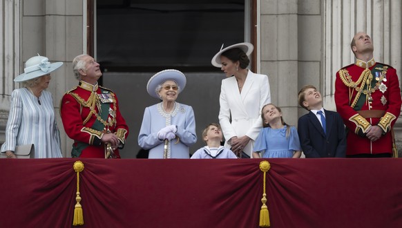 Camilla Duchess of Cornwall, Prince Charles, Queen Elizabeth II, Catherine Duchess of Cambridge, Prince George, Prince Louis, Princess Charlotte, Prince William, Duke of Cambridge, on the balcony of B ...