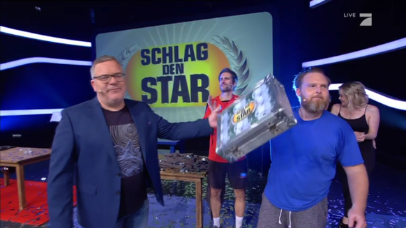 Zum zweiten Mal gewinnt Axel Stein 100.000 Euro bei Schlag den Star. 2014 hatte er den Wendler geschlagen.
