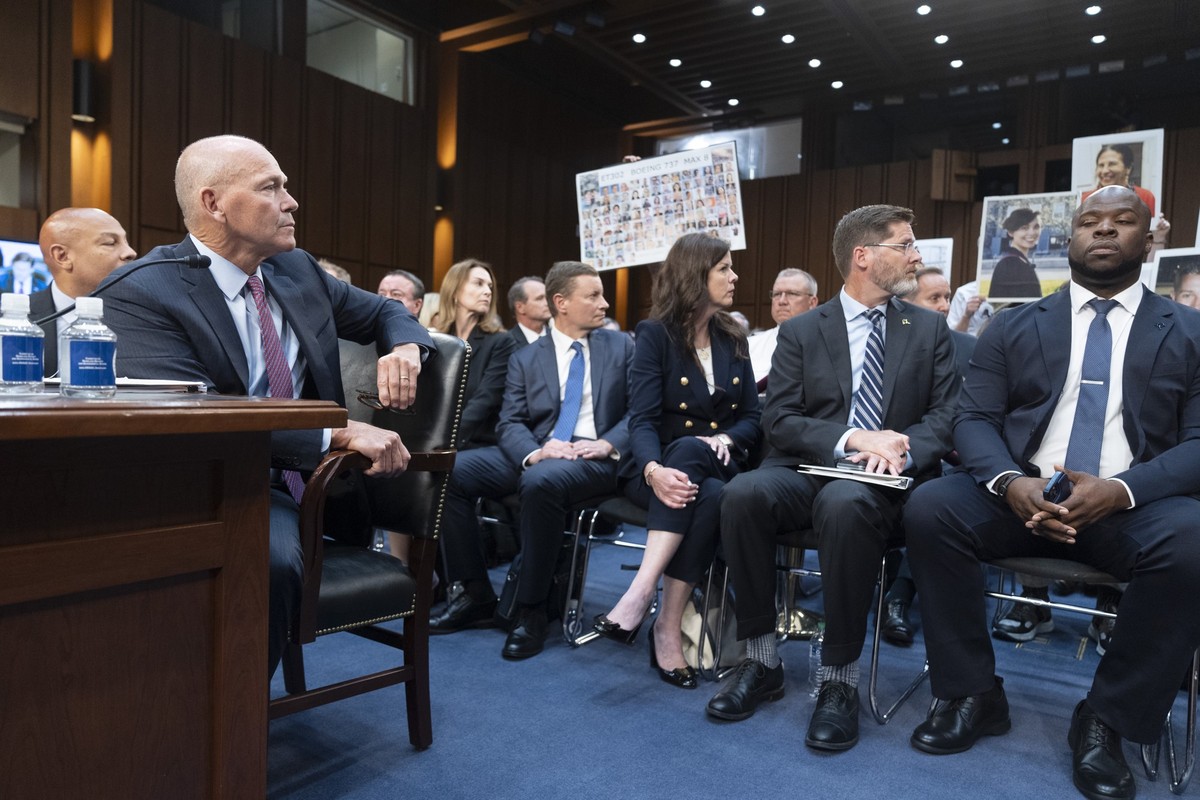 Boeing CEO Dave Calhoun, turns around and looks at the crowd as Senate Homeland Security and Governmental Affairs Subcommittee on Investigations Chairman Richard Blumenthal, D-Conn., acknowledges some ...
