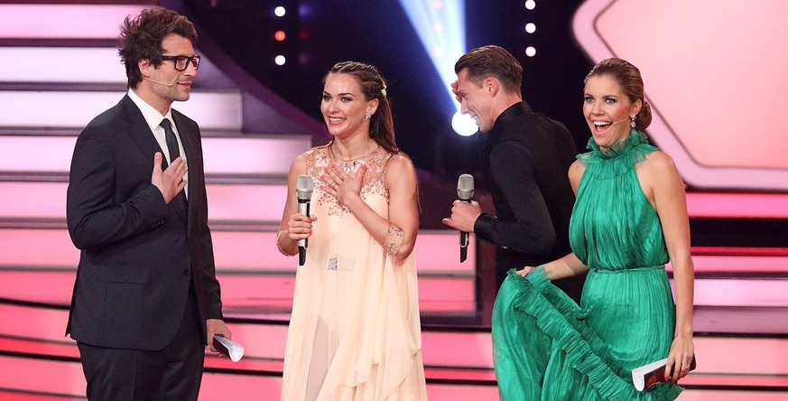 COLOGNE, GERMANY - MAY 11: Daniel Hartwich, Renata Lusin, Valentin Lusin and Victoria Swarovski during the 8th show of the 11th season of the television competition 'Let's Dance' on May 11, 2018 in Co ...