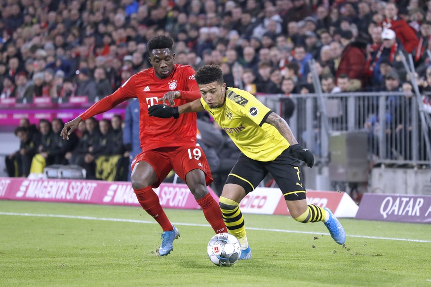 SANCHO Jadon Team BVB mit DAVIES Alphonso Fussball Bundesliga DFL Saison 2019-2020 Spiel FC Bayern Muenchen - Borussia Dortmund am 09.11. 2019 in Muenchen DFL REGULATIONS PROHIBIT ANY USE OF PHOTOGRAP ...