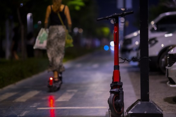 Electric scooter locked in park