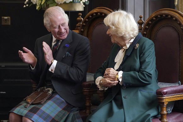 Britain's King Charles III and Camilla, the Queen Consort, attend an official council meeting at the City Chambers in Dunfermline, Fife, to formally mark the conferral of city status on the former tow ...
