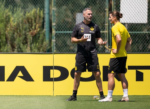 SAN DIEGO, CALIFORNIA - JULY 26: Marcel Sabitzer and Leiter Athletik Trainer Shad Forsythe of Borussia Dortmund during a training session on July 26, 2023 in San Diego, California. (Photo by Alexandre ...