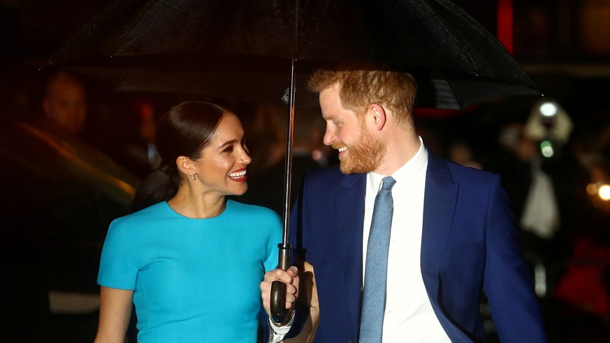 FILE PHOTO: Britain's Prince Harry and his wife Meghan, Duchess of Sussex, arrive at the Endeavour Fund Awards in London, Britain March 5, 2020. REUTERS/Hannah McKay/File Photo