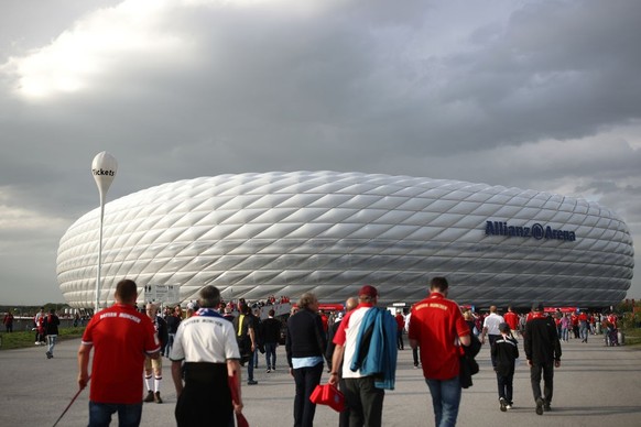 MUNICH, GERMANY - APRIL 25: Fans arrive outside the stadium prior to the UEFA Champions League Semi Final First Leg match between Bayern Muenchen and Real Madrid at the Allianz Arena on April 25, 2018 ...