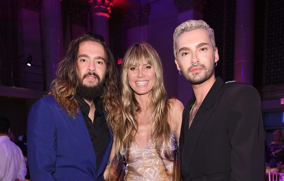 NEW YORK, NEW YORK - OCTOBER 28: (L-R) Tom Kaulitz, Heidi Klum and Bill Kaulitz attend the Angel Ball 2019 hosted by Gabrielle's Angel Foundation at Cipriani Wall Street on October 28, 2019 in Ne ...