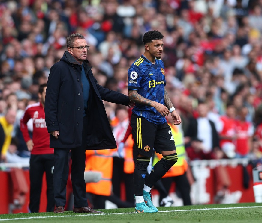 London, England, 23rd April 2022. Ralf Rangnick manager of Manchester United, ManU with Jadon Sancho of Manchester United during the Premier League match at the Emirates Stadium, London. Picture credi ...