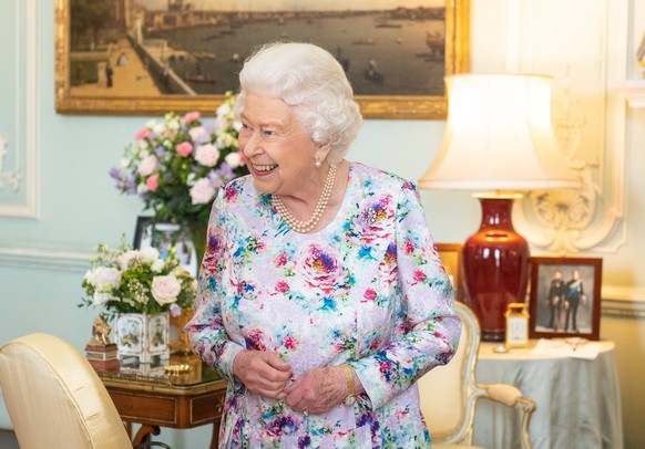 . 11/07/2019. London, United Kingdom. Queen Elizabeth II meets the outgoing Dean of the Chapel Royal Lord Chartres and Lady Chartres during a private audience at Buckingham Palace in London. PUBLICATI ...